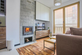 Studio with fireplace in the mountains